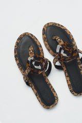 Womens leather flat suede thongs in cheetah print with comfort foam padding and resin buckle by JULKE 