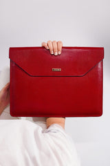 Unisex leather laptop sleeve in red colour with reptile texture by JULKE