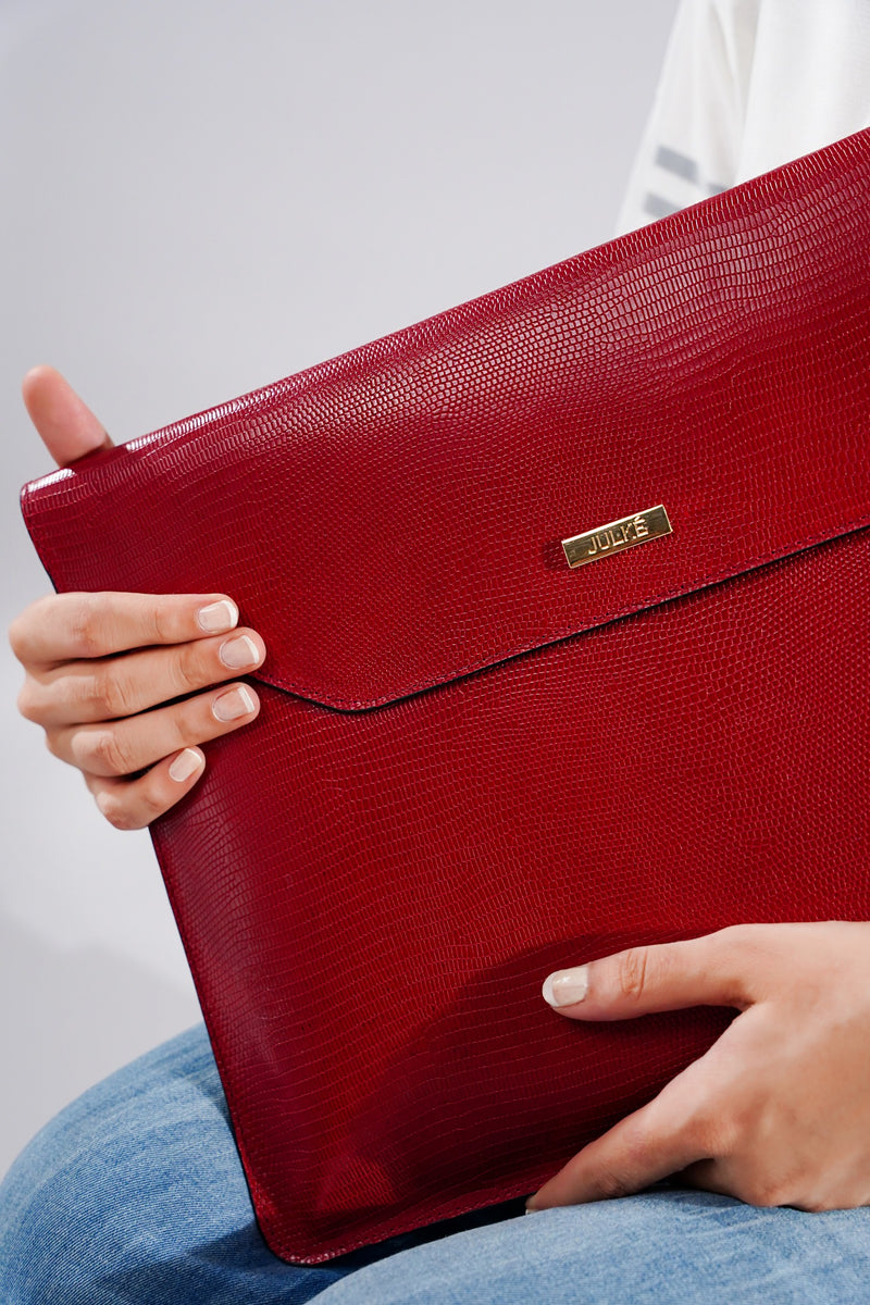 Unisex leather laptop sleeve in red colour with reptile texture by JULKE