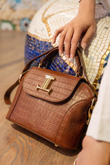 Womens leather shoulder bag with top handle in brown colour with croc texture by JULKE