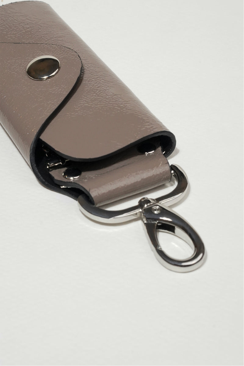 Leather key ring set in glossy grey brown colour with silver metal hook by JULKE