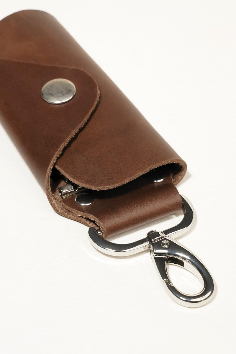 Leather key ring set in dark brown colour with silver metal hook by JULKE