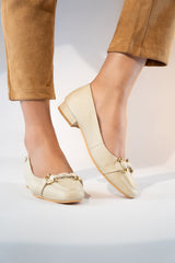 Women's leather block heel pumps in off white colour with gold & white horseshoe buckle and square toe by JULKE