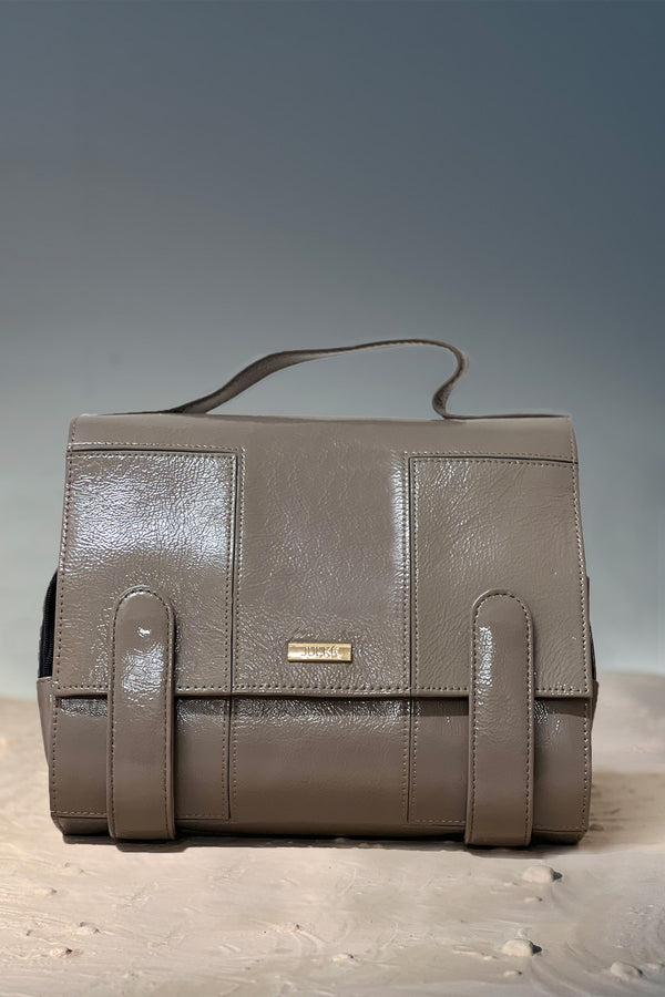 Women's leather makeup bag in grey colour with built in pockets and pouches by JULKE 