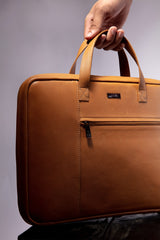 Leather laptop sleeve in light brown colour with top handle by JULKE