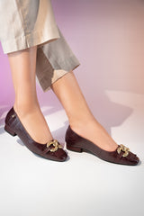 Women's leather block heel pumps in burgundy colour with croc texture and gold horseshoe buckle with leather fringe by JULKE