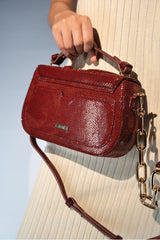 Women's leather top handle shoulder bag in dark red colour with snake print & texture by JULKE 