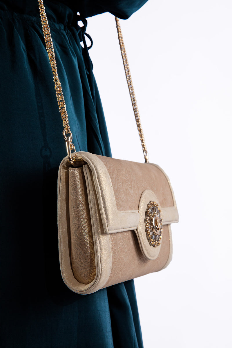 Womens leather shoulder bag and clutch in light gold colour with flower diamante brooch by JULKE