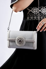 Womens leather shoulder bag and clutch in silver colour with flower diamante brooch by JULKE