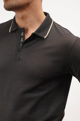 Mens polo shirt in black colour with zipper plackett and beige contrast tipped collar and sleeves by JULKE