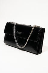 Womens leather clutch wallet in black colour with pockets and metallic long silver chain by JULKE 