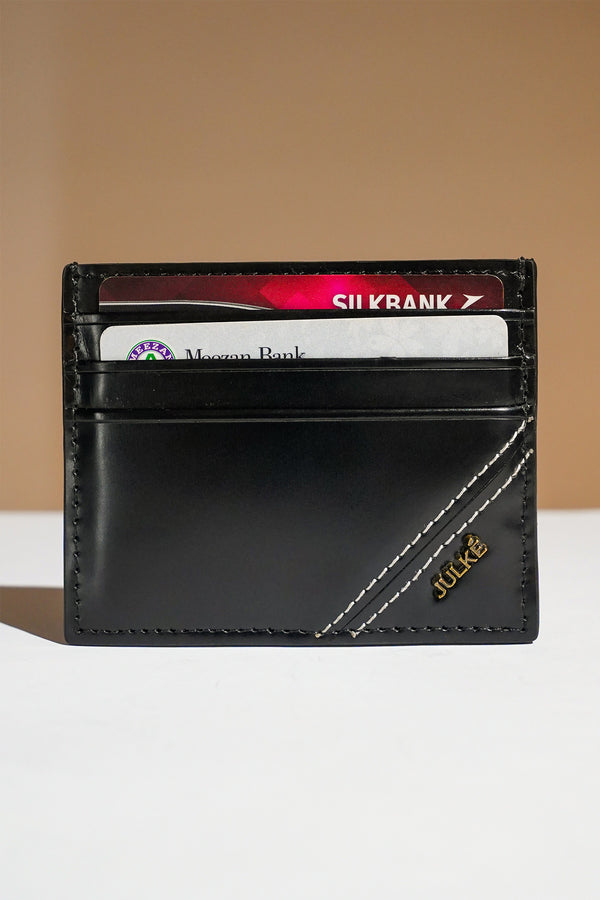 Mens leather card holder in black colour with diagonal white contrast stitch and metallic hardware by JULKE