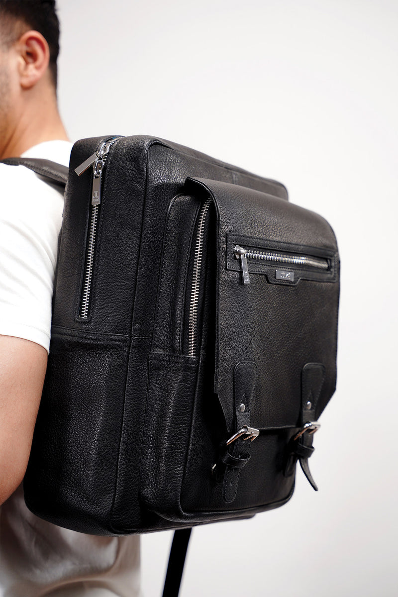 Mens original leather backpack in black colour in rectangle shape with travel pockets by JULKE