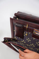 Original leather laptop briefcase bag wth reptile texture in two tone dark red colour by JULKE