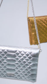 Womens leather shoulder bag clutch in bronze & silver colour with quilting and gold metal chain by JULKE