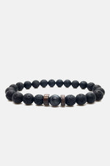 Mens flexible wristband with volcanic beads in black colour by JULKE