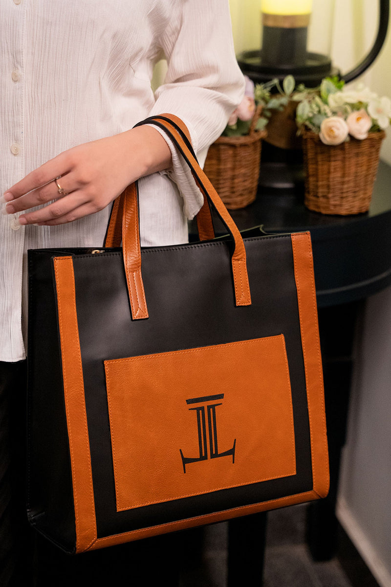 Womens leather tote bag in black and orange colour in large size by JULKE