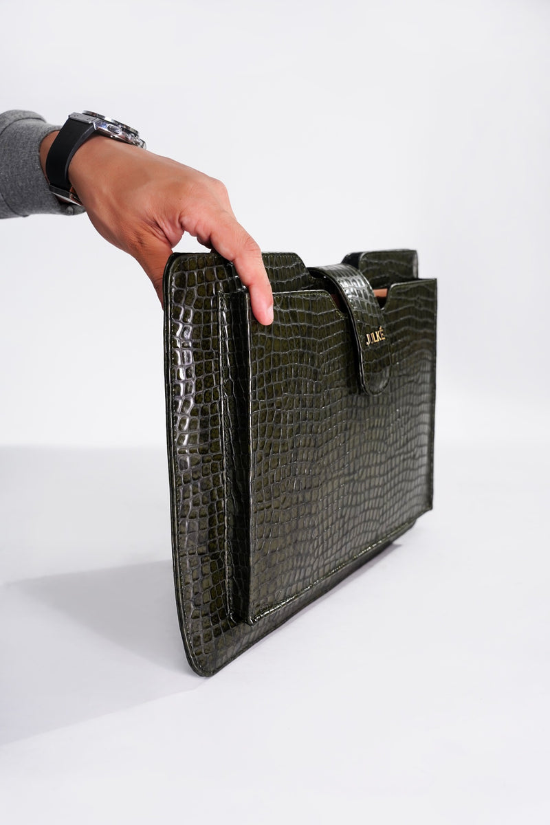 Leather laptop sleeve in green colour with crocodile texture by JULKE