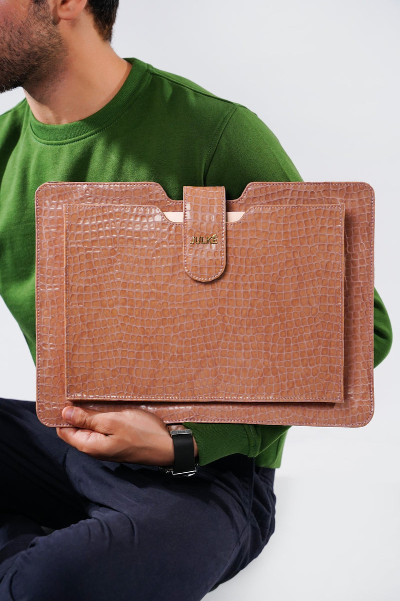 Leather laptop sleeve in light pink colour with crocodile texture by JULKE